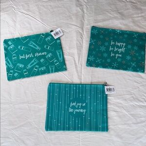 NEW WITH TAGS! A Trio Of Teal Makeup Pouches With Inspirational Quotes On Them.